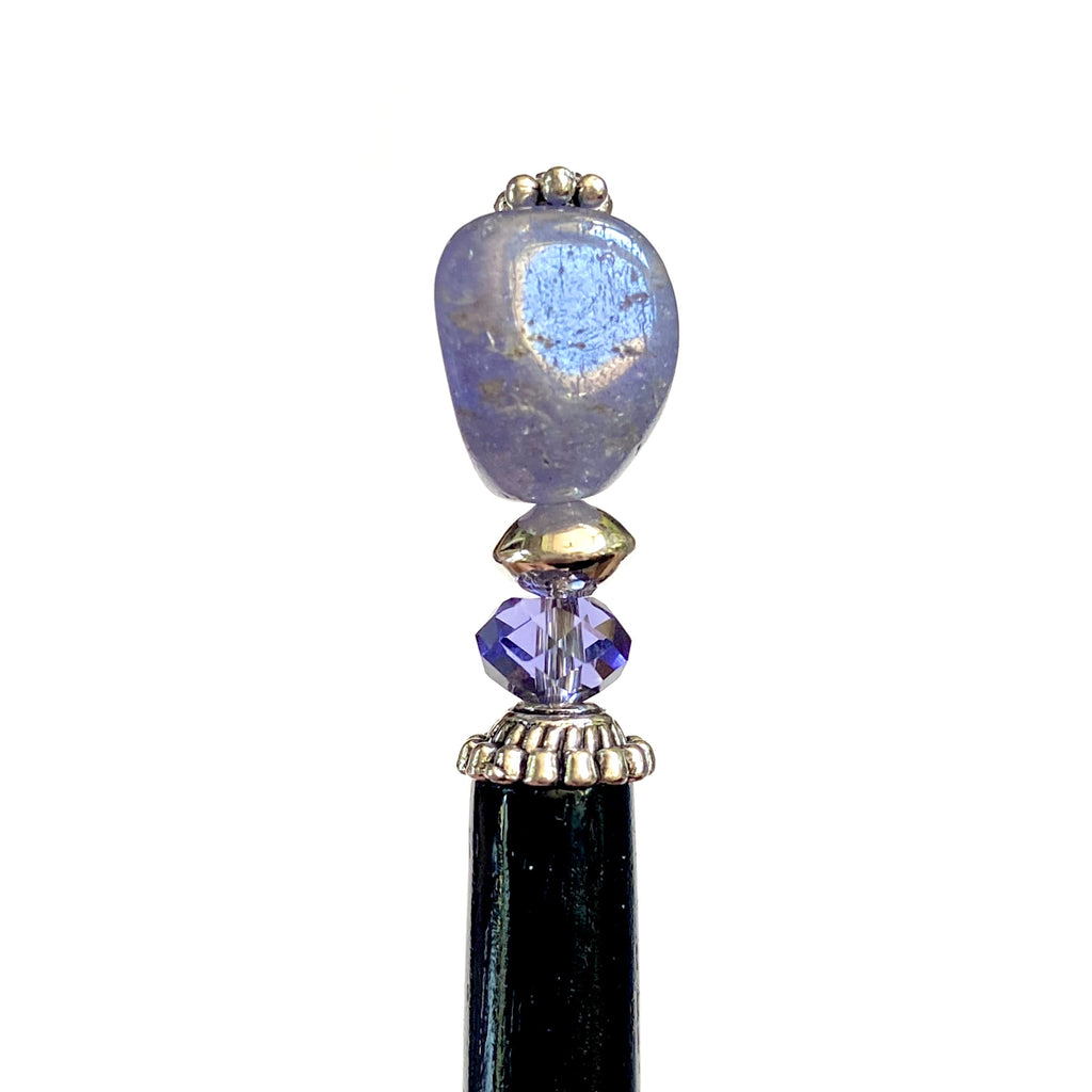 A close up of our Claudia Hair Stick made from Tanzanite Stone and matching Swarovski crystal