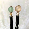 The two styles of Tidal Hair sticks that use African Recycled glass beads.