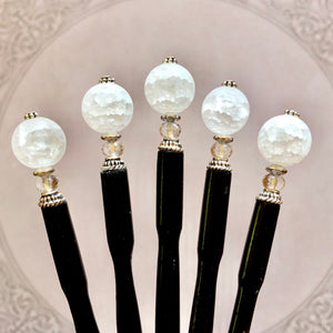 Five of the the Elodie Hair Stick made from frosted white crackle quartzite beads.