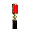 A close up of the Nela Tidal Hair Stick made from a red Czech glass bead