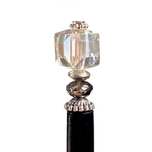 A close up of the Nicole Tidal Hair Stick made with an iridescent clear square bead and crystal accent