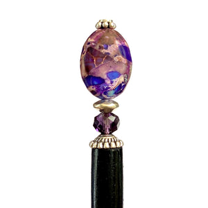 A close up of the Petra Tidal Hair Stick made with purple jasper stone beads.