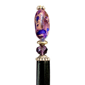 A close up of the Petra Tidal Hair Stick made with purple jasper stone beads.