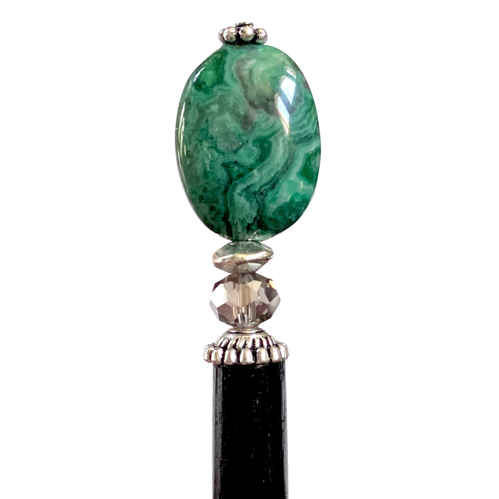 A close up of the Quinn Tidal Hair Stick made from green crazy lace agate stone beads