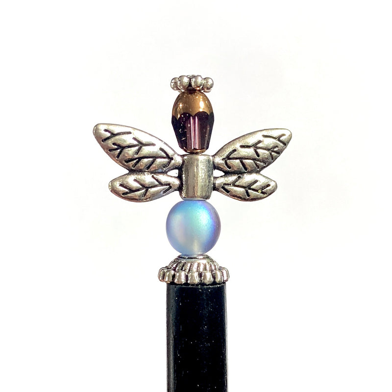 A close up of the Aria Tidal Hair Stick