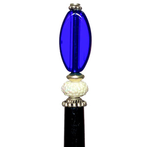 A side view of the Stella Tidal Hair Stick made from cobalt blue glass beads.