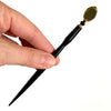 The standard size of our Trinity hair sticks made from gold rimmed black Czech glass beads.  