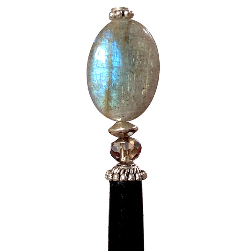 A close up of the Malia Tidal Hair Stick made from gray Labradorite stone beads