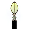 A close up of our Brooke Hair Stick made from green -blue ombre Czech glass beads