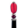 A close up of our Madelaine Hair Stick made from bright red Czech glass beads