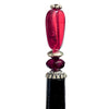 A close up of our Madelaine Hair Stick made from bright red Czech glass beads