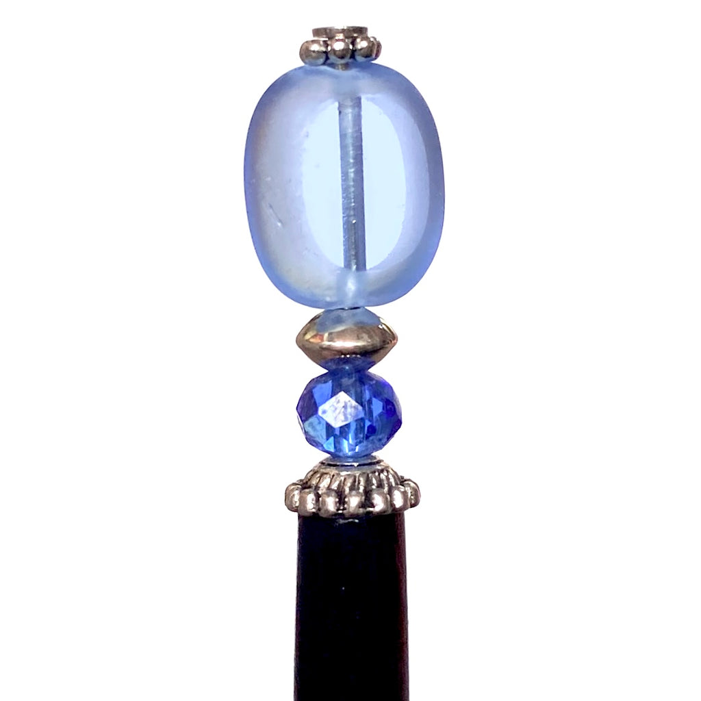 A close up of our Sydney Hair Stick made from sapphire blue Czech glass beads.
