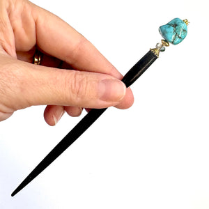 A full shot of the standard size of the Indie Tidal Hair Stick made with turquoise Magnesite nuggets.