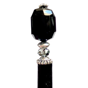 A close up of our Laura Hair Stick made with Onyx nuggets and Austrian crystal accent.