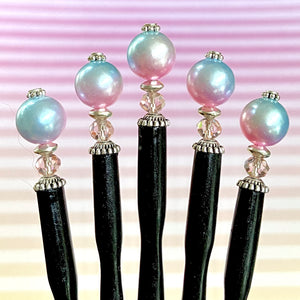 Five of our Olivia Hair Sticks made from pastel pink and blue acrylic bubblegum beads.