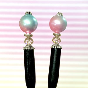 A set of our Olivia Hair Sticks made from pastel pink and blue acrylic bubblegum beads.