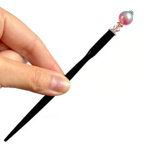 The standard size of our Olivia Hair Sticks made from pastel pink and blue acrylic bubblegum beads.