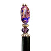 A close up of the Petra Tidal Hair Stick made with purple jasper stone beads.