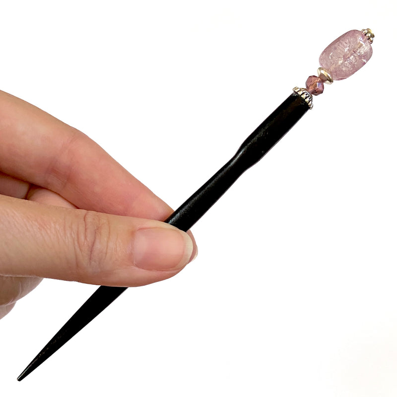 A close up of the Taylor hair stick is made with lilac purple Quartz nugget beads.