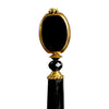 A close up of our Trinity hair sticks made from gold rimmed black Czech glass beads.  