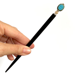 A full shot of the Adelaide Tidal Hair Stick with the large base