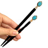 A standard and a large Adelaide Tidal Hair Stick.