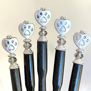 A set of five of our handmade Bailey hair sticks made with a metal dog paw print bead and Swarovski crystal.