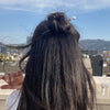 Actress Ciara Robinson models the Bailey Hair Stick in her half up hair bun