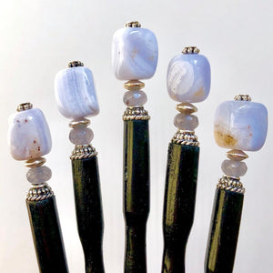 Five of the Bella Tidal Hair Stick made from blue lace agate stone.