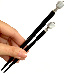 The standard and the large sizes of the Bella Tidal Hair Stick.