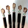 A group of five of our Blake Hair Sticks made from brown Smoky Quartz Stones with Swarovski Erinite Crystals.