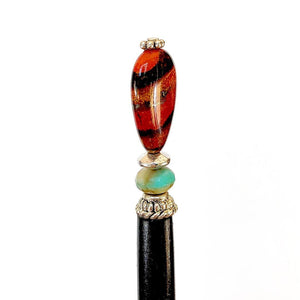 A close up side view of the Bree Tidal Hair Stick made from a teardrop Jasper bead.