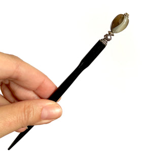 A full picture of the Cassie Hair Stick made from lavender gray agate stone nuggets.