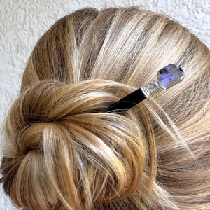 Blonde woman wearing one Dylan Hair Stick made from Labradorite stone