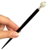 The large size of the the Elodie Hair Stick made from frosted white crackle quartzite beads.
