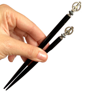 The standard and large sizes of the Freedom Hair Sticks