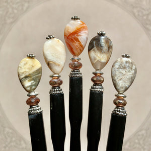 Five of the Gemma Tidal Hair Stick made from Bamboo Agate Stone beads. showing the variations in color