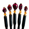 Five of our Gia hair sticks made from garnet nuggets.
