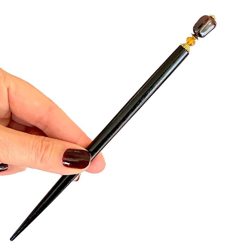 A close up of our Gia Hair Stick made from natural garnet nuggets and Swarovski crystals.
