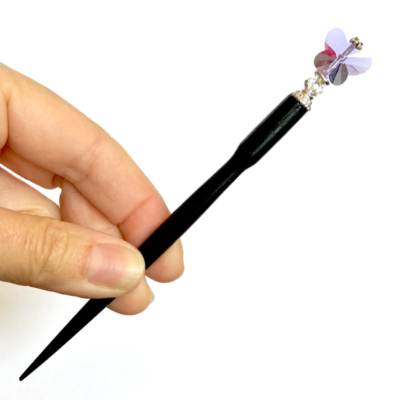 The large size option of our purple Iris Hair Stick