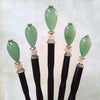 Five of the Joanna Tidal Hair Sticks made from aqua green aventurine stone beads