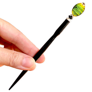 The standard size of our Kaja Hair Stick made from green swirl Czech glass beads