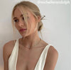 Actress Michelle Randolph wears a Kat Hair Stick in her low messy bun.