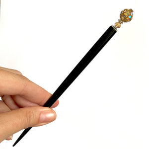 The large size of the Kathleen Hair Stick made from a gold Czech glass bead