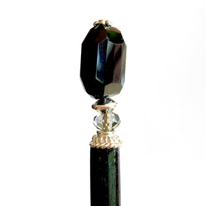 The side view of our Laura Hair Stick made with Onyx nuggets and Austrian crystal accent.