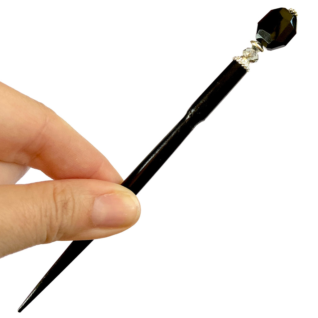 A full shot of the standard size of our Laura Hair Stick made with Onyx nuggets and Austrian crystal accent.