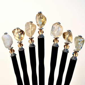Variations in color and shape in the Layla Hair Stick made from Yellow Citrine nugget beads.