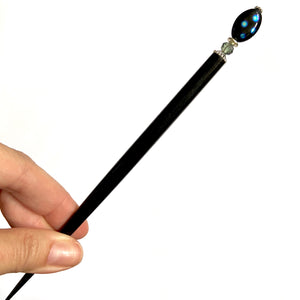 The large size of the Melanie Tidal Hair Stick made from black Czech glass beads.