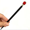 The large size of the Nela Tidal Hair Stick made from a red Czech glass bead.