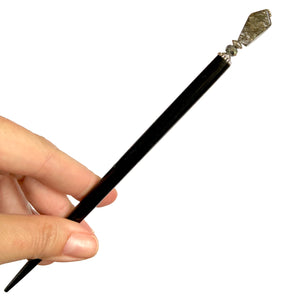 The large size of our Palmer Hair Stick made from black rutile quartz stone.